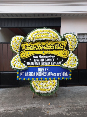 Papan Bunga Duka di Guna
