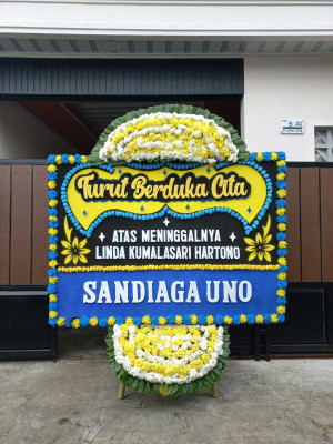 Papan Bunga Duka di Guna